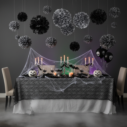 Spooky Halloween party room with black fluffy tissue pom poms hanging in three sizes pumpkins bats and spider webs