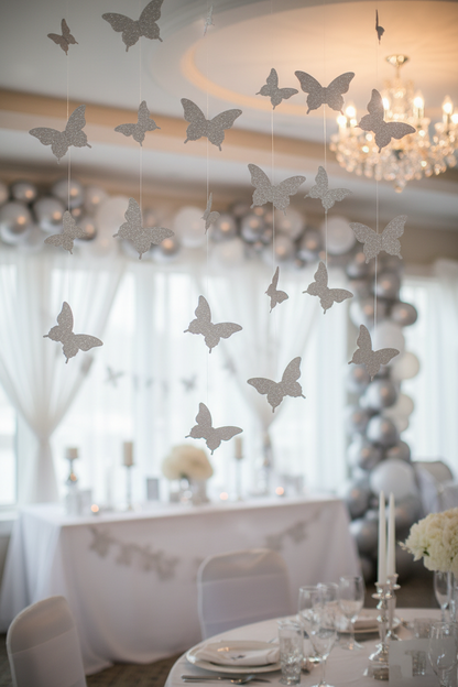 Glitter silver butterfly string decoration hanging in party room